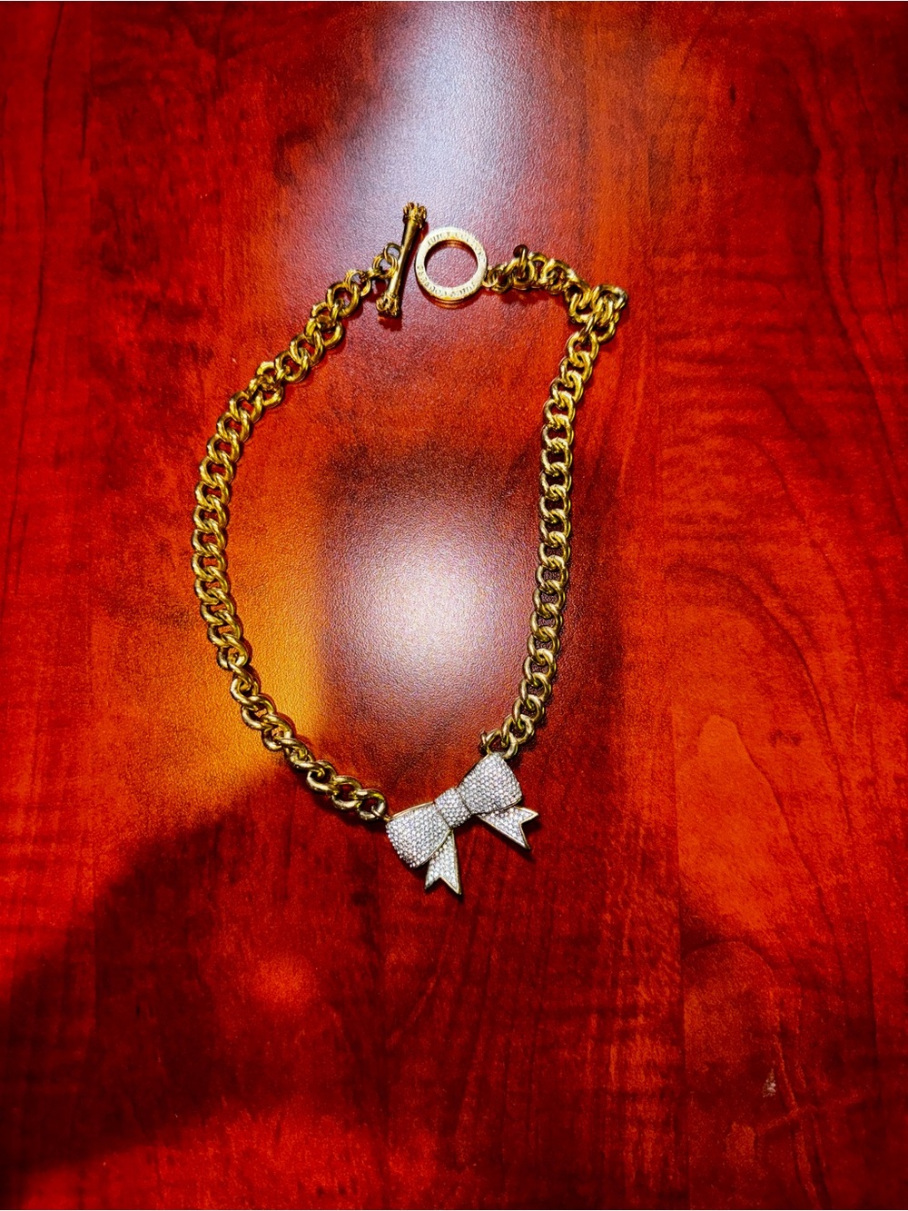Juicy Couture Gold Necklace with Bow Pendant